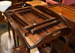 A mahogany folding butler's tray in George III style, with a later associated stand for use as a