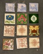 A box containing a quantity of various tiles, printed and Majolica type