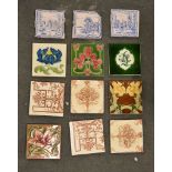 A box containing a quantity of various tiles, printed and Majolica type