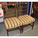 A pair of mahogany side chairs in George III style, 20th century, the pierced four spar backs and