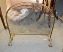 A brass and wire mesh arch topped firescreen in early 19th century style, circa 1900, 68cm high