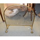 A brass and wire mesh arch topped firescreen in early 19th century style, circa 1900, 68cm high