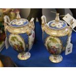 A pair of Dresden two handles urns and covers, each decorated with Watteauesque panels, 22cm high