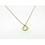 9ct Yellow Gold curb chain and 9ct yellow Gold open heart pendant with Diamond.