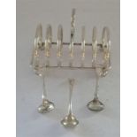 Edwardian Silver Plate Toast Rack together with Three Silver Plate Spoons