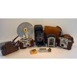 Four Vintage Cameras Including Zeiss Ikon, Braun Paxette, Ensign Selfix, Kodak Duaflex II