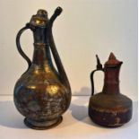 Two Antique Copper Bedouin Coffee Pots