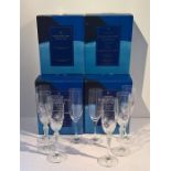 12 Dartington Crystal Champagne Flutes together with 6 others