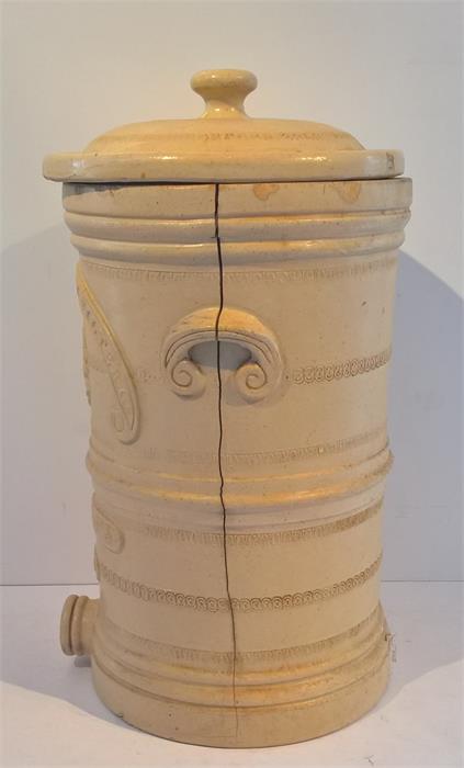 A Victorian Stoneware water filter and cover by the Silicated Carbon Filter Co of Battersea, London