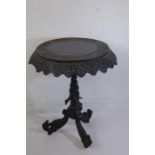 An 18th / 19th C. Carved Burmese Hardwood Tripod Tip Top Table