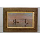 C. DAVIS Early 20th Century Oil on Canvas Depicting Fishing Boats at Sail Off the Coast at Sunset