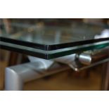 An Italian Designer Glass Topped Extending Dining Table