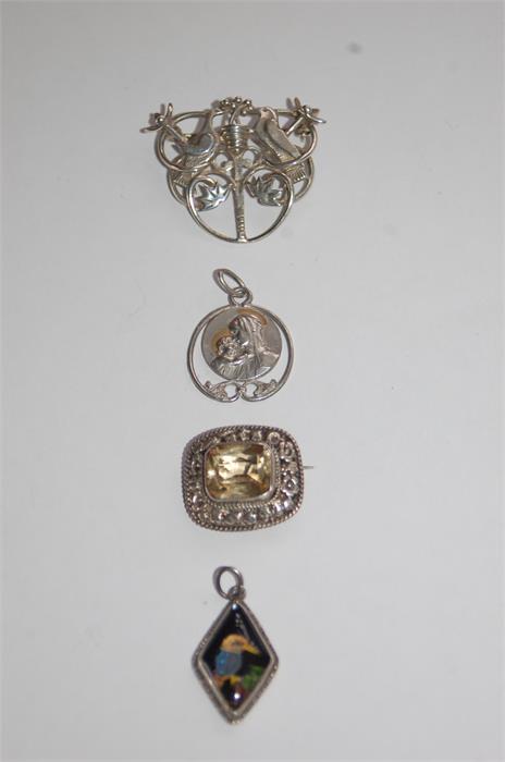 Two Silver Brooch Together With Two Silver Necklace