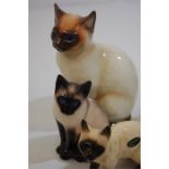 A Collection of Three Vintage Siamese Cats and One Dog, One Other