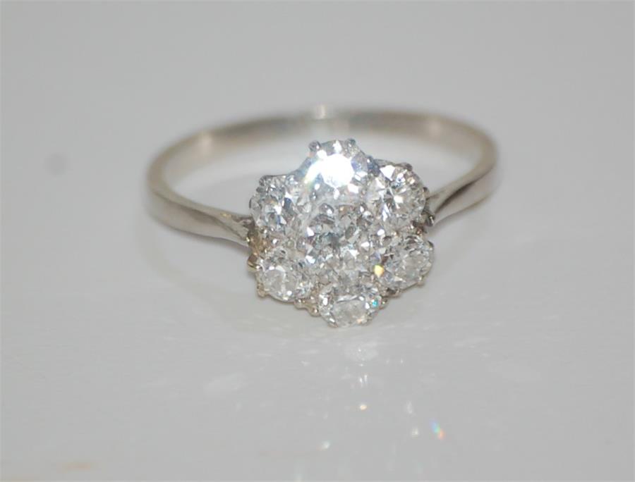A Platinum Ladies Ring Set Seven Bright Cut Diamonds