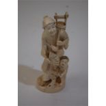 A LATE 19TH CENTURY JAPANESE MEIJI PERIOD IVORY OKIMONO of A Mother And Child