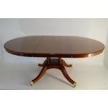 A Recent Mahogany Circular Extending Dining Table