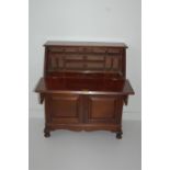 An Edwardian Mahogany Drop Front Bureau Two Drawers Above Cupboard