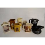 A Collection of Vintage Whisky Water Jugs