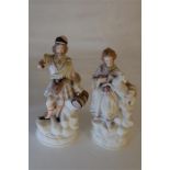 Pair Bisque Figurines - A Highland Gentleman (AF Arm) and Lady Holding a Lamb