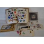 Small Stamp Album Containing Various Stamps from Different Countries