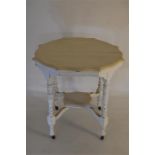 An Edwardian Octagonal Two Tier Table with Original Casters Hand Painted White