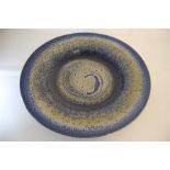 A Large Glazed Studio Pottery Platter Decorated in Abstract Blue and Gold