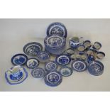Large Collection of Blue and White Willow Patterned Porcelain