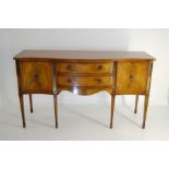 A Reproduction Serpentine Fronted Sideboard on Tapering Legs