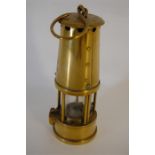 19th/20th C Brass miners lamp ‘PROTECTOR LAMP & LIGHTING CO LTD ECCLES’ to front bad.