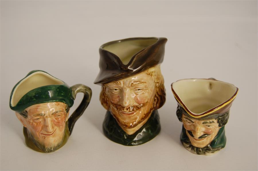 Three Royal Doulton Miniature Character Jugs, Robin Hood, Auld Mac (D 6253) and one other