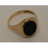 Gents 9ct Gold Ring Set Black Stone, gross weight 4.3 grams