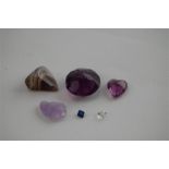 A Group of Semi-Precious Stones, the larger Amethyst Colour Stone 15mm diam.