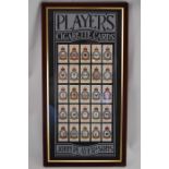 A Framed Collection of RAF Squadron Players Cigarette Cards.