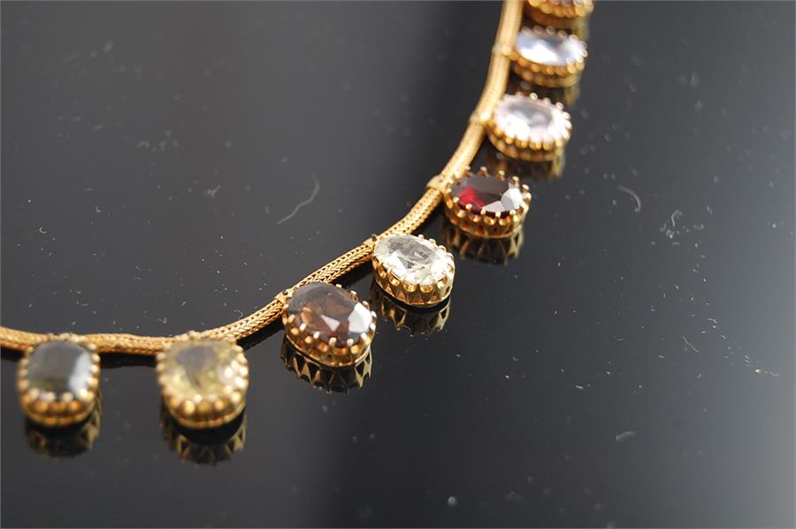 Gold metal fine rope-twist necklace, suspended a fringe of 21 semi-precious stones - Image 2 of 11