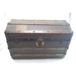 A Metal and Wood Bound Vintage Trunk