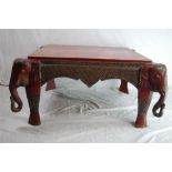 An Indian Vintage Low Coffee Table with Carved Elephant Head Legs, Inset with Coloured Glass