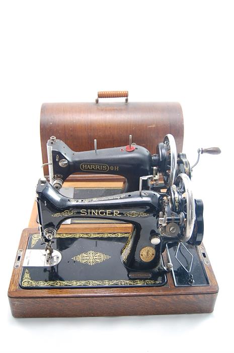 A Vintage Singer Sewing Machine together with Vintage Harris Sewing Machine