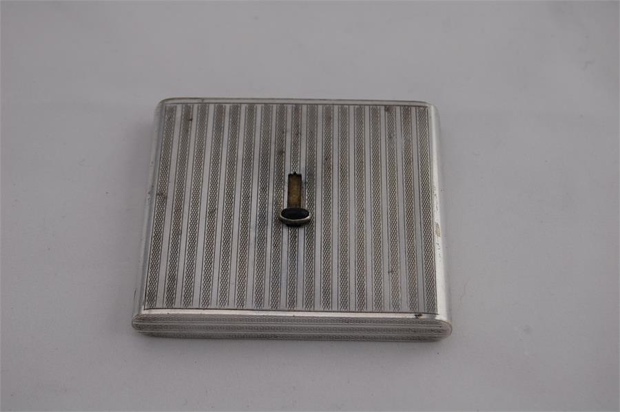A Vintage Silver Plate Cigarette Case with Concealed Opening