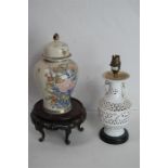 An Oriental Lidded Jar on Stand together with an Oriental White Pierced Porcelain Lamp Base