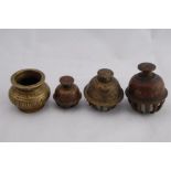 Three Small Vintage Tibetan Graduated Brass Bells Together With a Small Brass Pot.