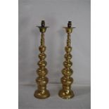 A Pair of Brass Turned Lampstands