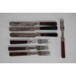 A Set of Seven Onyx Handled Silver Plate Fruit Knives and Forks