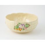 Clarice Cliff Table Bowl embossed with fruit and woven basket pattern, printed marks, 23cm dia