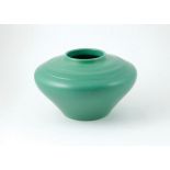 Wedgwood Keith Murray Compressed Circular Vase horizontal ribbed, matt green glaze, printed marks,