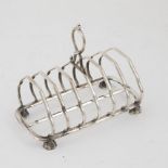 Edw VII S/S Toast Rack 6 division with fixed handle on 4 octagonal feet, Sheffield, 1902.