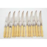 Set of Twelve S/S Dessert Knives & Eleven Forks with carved bone handles, engraved knife blades,