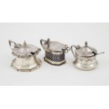 Three S/S Mustard Pots of sizes, various dates and makers, with spoons