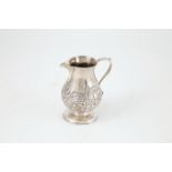Geo III S/S Sparrow Beak Cream Jug baluster shape with embossed floral. Scroll and cartouche