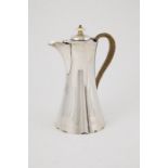 Geo V S/S Hot Water Jug plain waited shape with waved rim and base, rattan bound handle, engraved